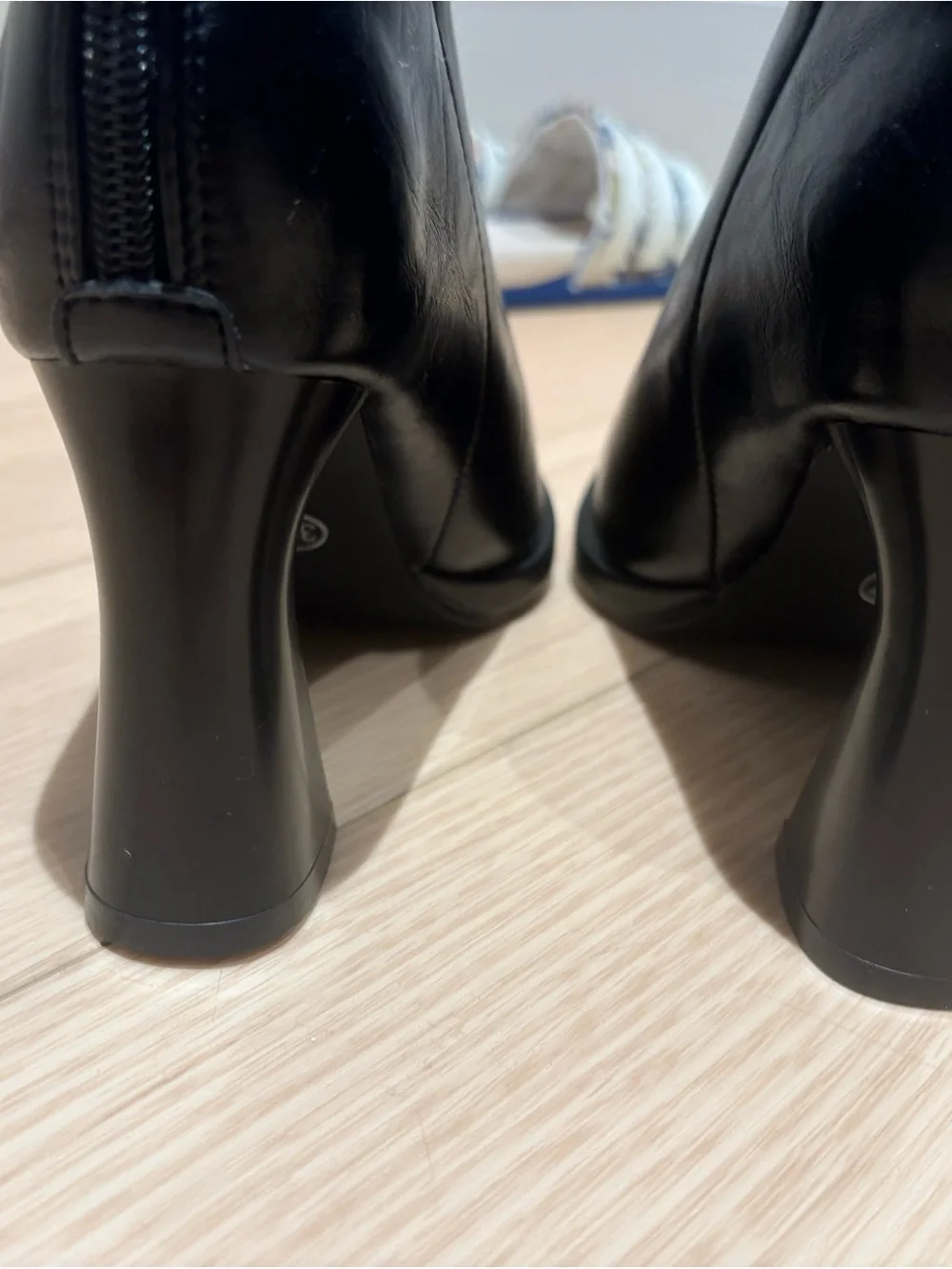 Black Leather Pointed Ankle Boots with Silver Metal Toe Accent